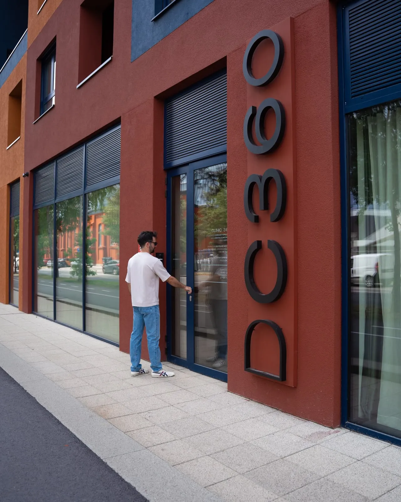 The entrance to DC360 with the large logo on the facade